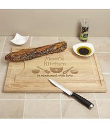 Beeldcitaat: http://www.gifts.com/product/personalized-seasoned-with-love-cutting-board?prodID=560717
